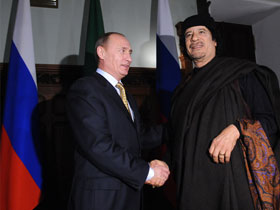 Владимир Путин и Муаммар Каддафи. Фото: expert.ru