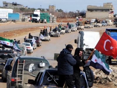 Колонна протурецких сил сирийской оппозиции. Фото Фото: DHA-Depo Photos / AP, источник - rbc.ru
