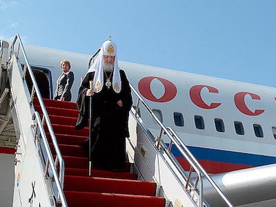 Патриарх Кирилл и самолет. Фото: polit.ru