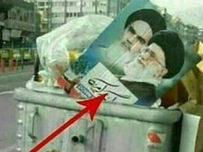 Мусорный бак с портретом "нацлидера" после проправительственной демонстрации в Иране. Источник - twitter.com/behroozAlvandi