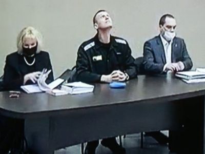 Навальный приговорён к 9 годам строгого режима